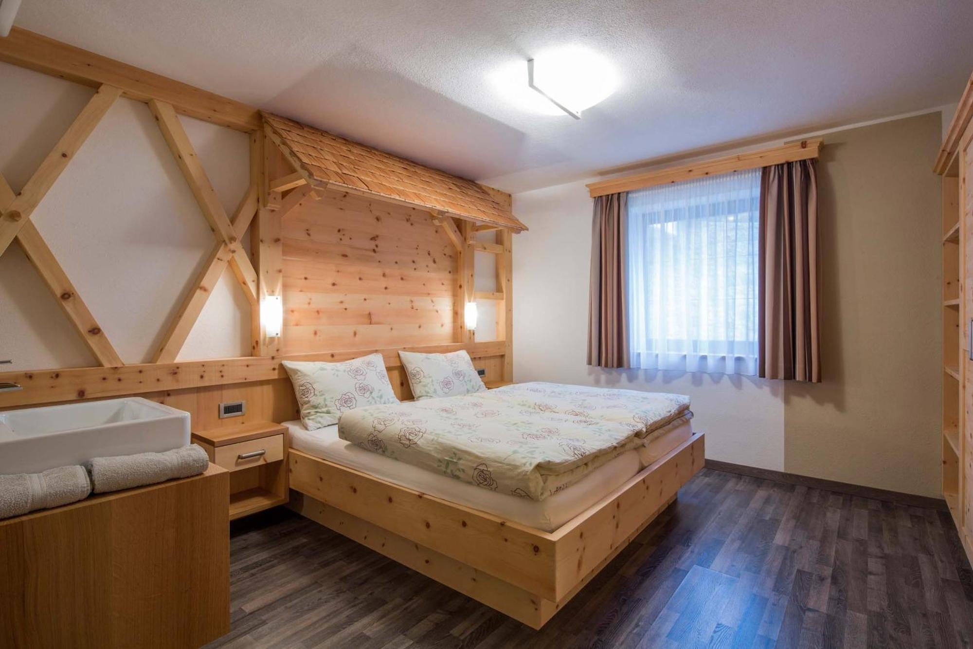 Alpin Apartments Colfosco Szoba fotó